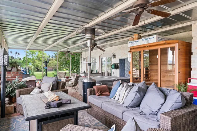 a outdoor living space with furniture and garden view