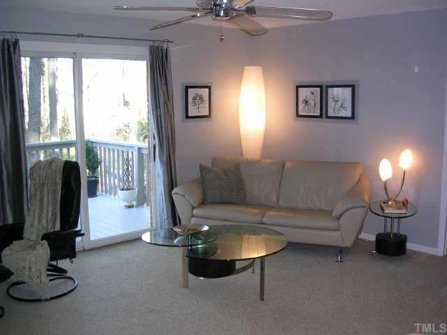 3500 Neptune Drive Raleigh, NC 27604 - Photo 6 of 10 Living room has sliding door to deck