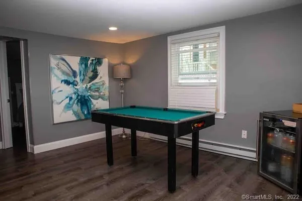 a room with furniture and a window