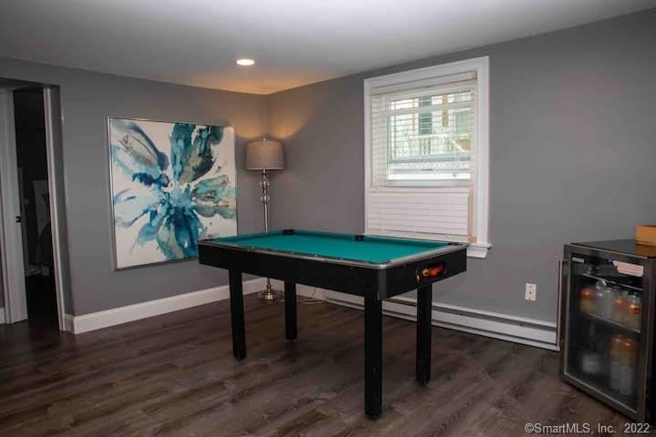 21 Grove Way, Unit 21 Clinton, CT 06413 - Photo 11 of 37 a room with furniture and a window