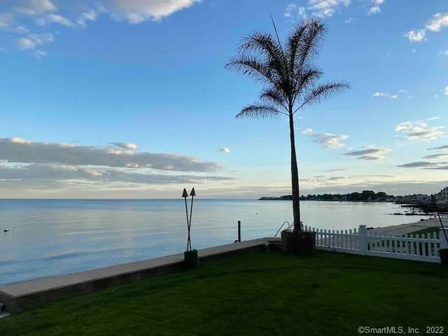 a view of a garden and lake