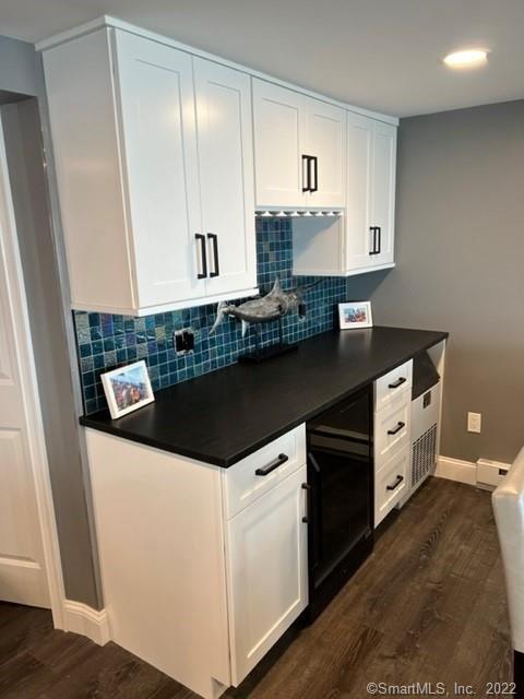 21 Grove Way, Unit 21 Clinton, CT 06413 - Photo 25 of 37 a kitchen with a sink and white cabinets
