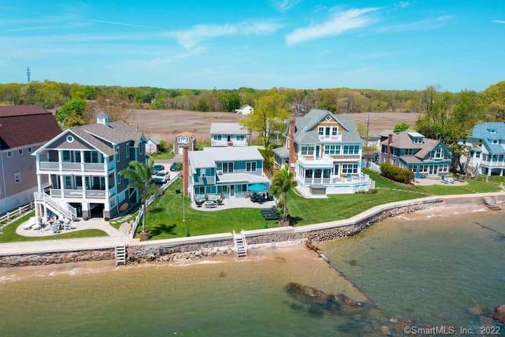 21 Grove Way, Unit 21 Clinton, CT 06413 - Photo 29 of 37 an aerial view of a house with a garden and lake view
