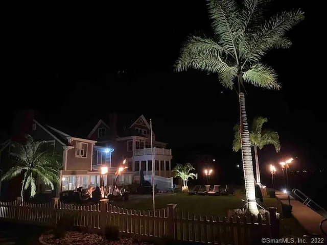 a view of a house with a street