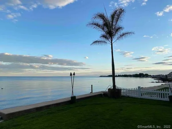 a view of a garden and lake