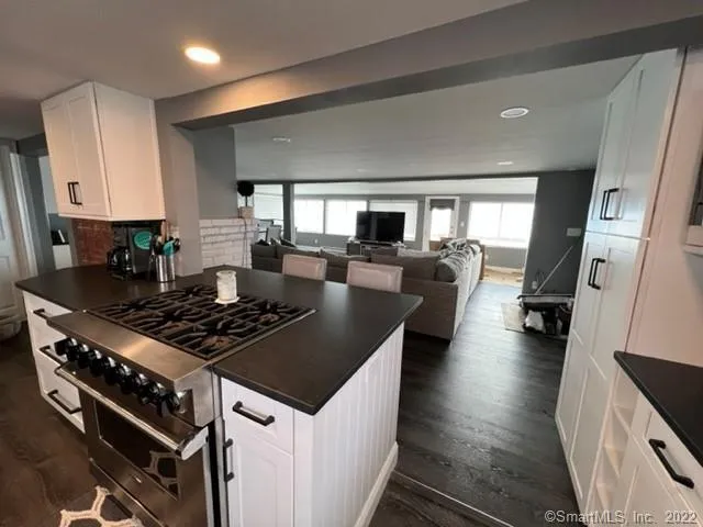 a kitchen with a stove and a sink