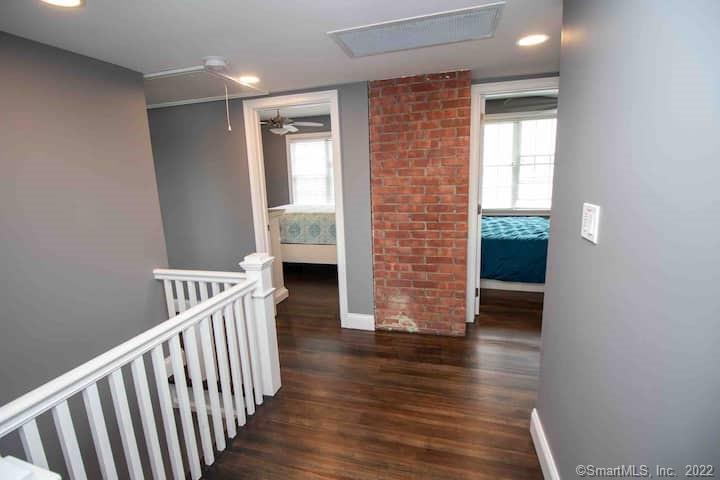 21 Grove Way, Unit 21 Clinton, CT 06413 - Photo 10 of 37 a view of livingroom with furniture and wooden floor