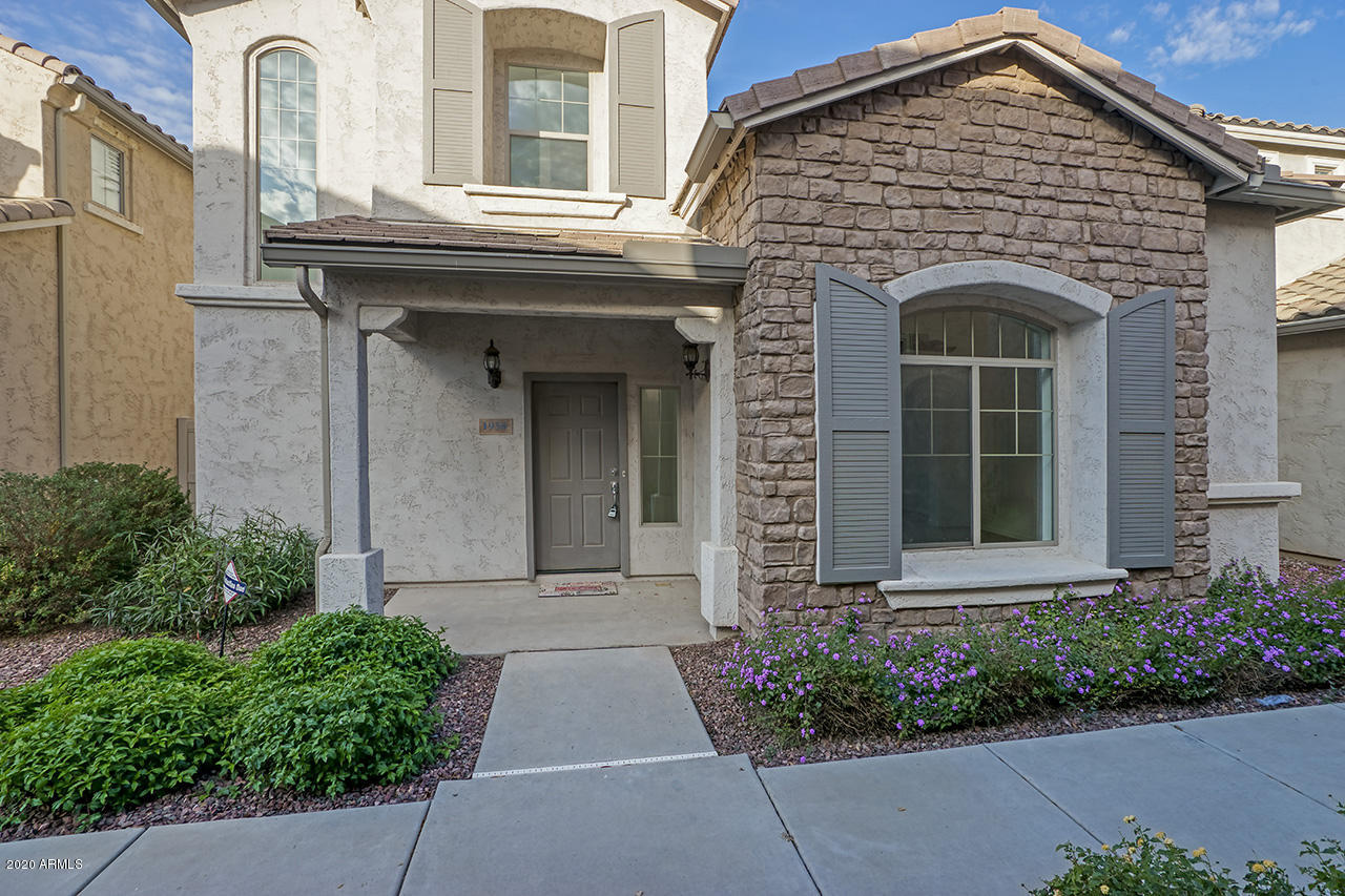 1958 West Davis Road Phoenix, AZ 85023 - Photo 1 of 25 front view of a house with a garden