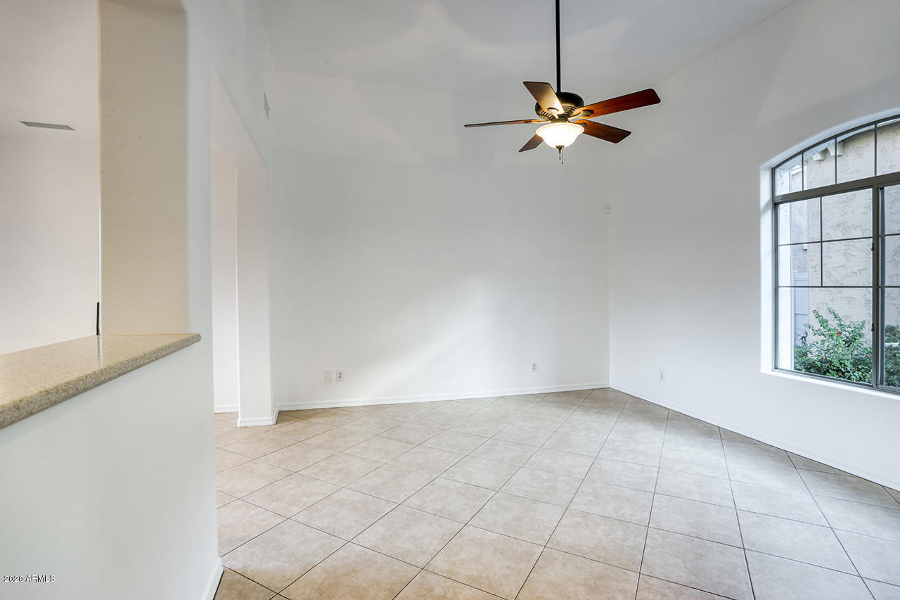 1958 West Davis Road Phoenix, AZ 85023 - Photo 3 of 25 a view of empty room with window and chandelier fan