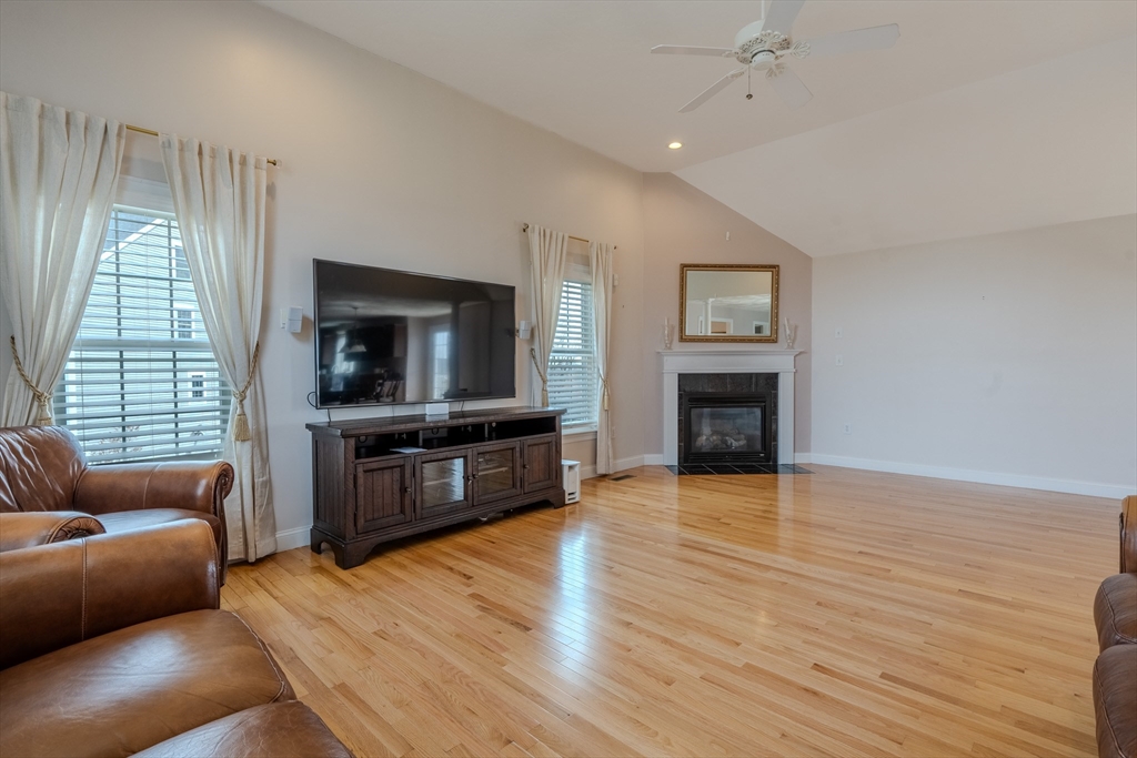 9 Kettle Way Dracut, MA 01826 - Photo 3 of 19 a living room with furniture and a flat screen tv
