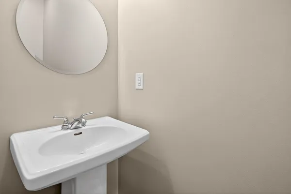 a view of a hallway with a wooden door