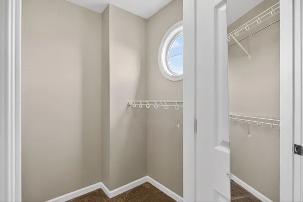 a bathroom with a shower and a shower