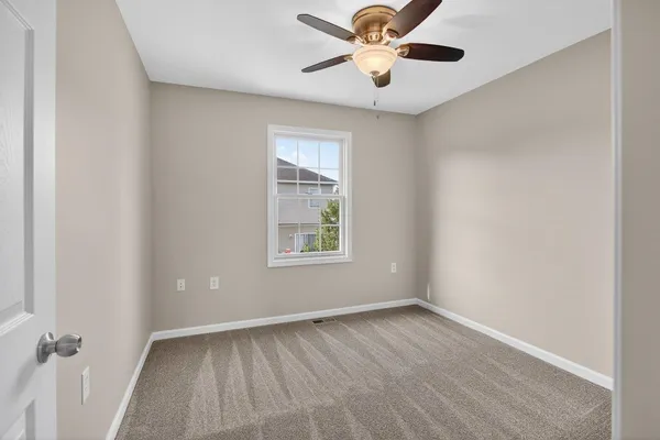 a utility room with sink dryer and washer