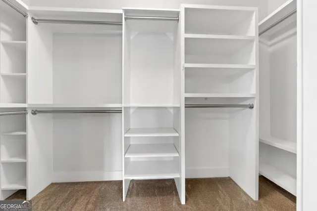 a view of an empty walk in closet