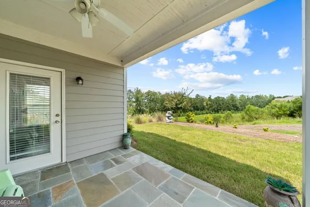 a view of an empty room with a ocean view