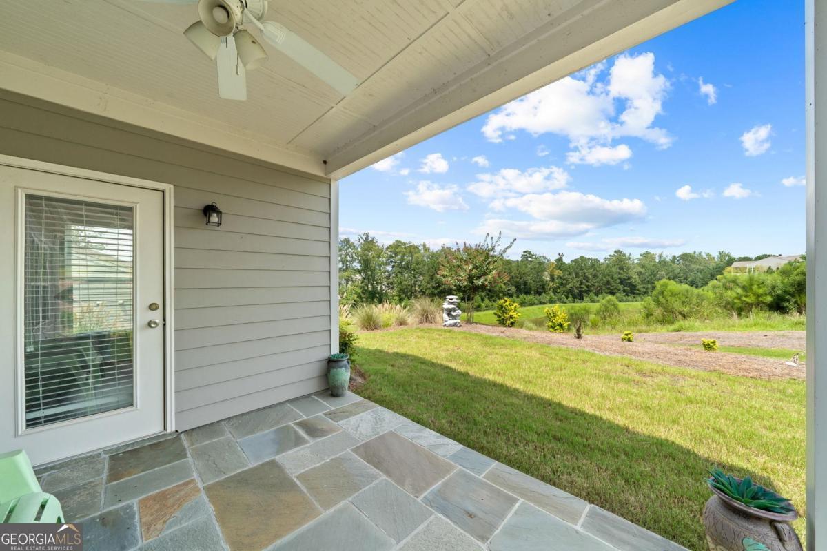 1061 Little Shls Road Greensboro, GA 30642 - Photo 36 of 41 a view of an empty room with a ocean view