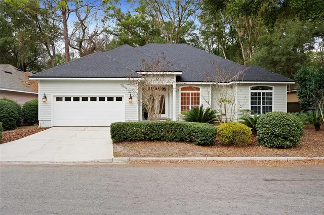a house with a yard and parking space