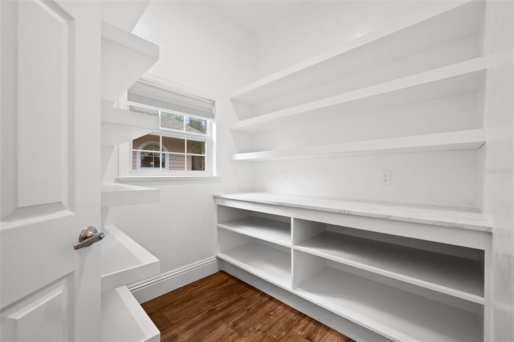 9702 Southwest 35th Lane Gainesville, FL 32608 - Photo 16 of 46 a view of an empty room with a window