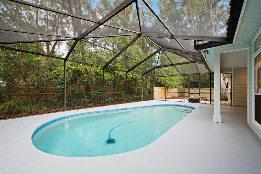 9702 Southwest 35th Lane Gainesville, FL 32608 - Photo 34 of 46 a view of indoor pool and deck