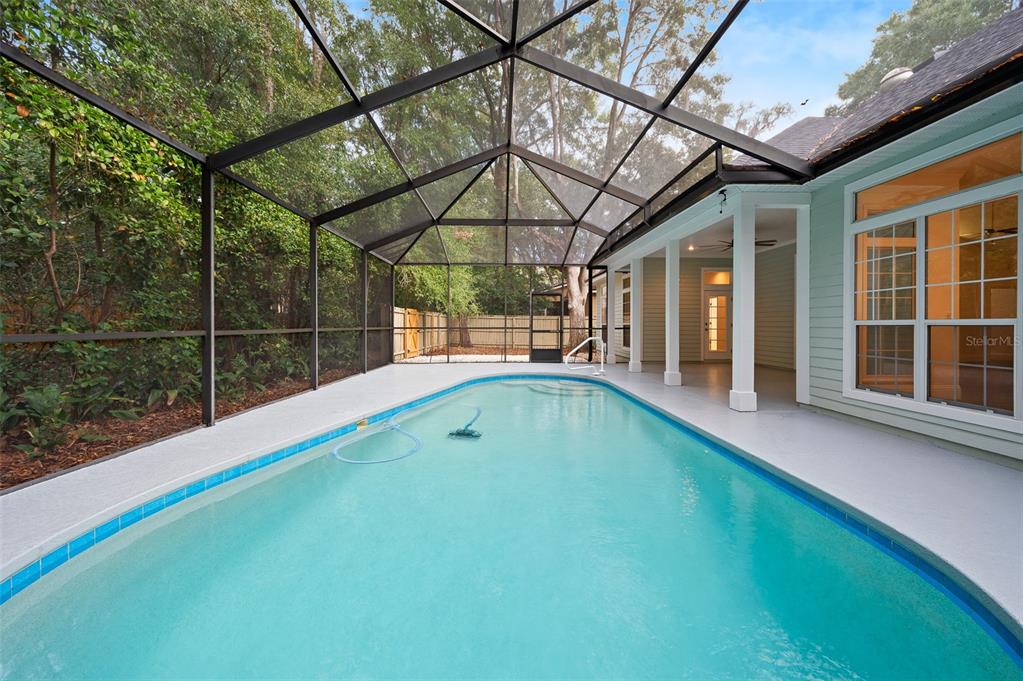 9702 Southwest 35th Lane Gainesville, FL 32608 - Photo 37 of 46 a view of outdoor space with swimming pool