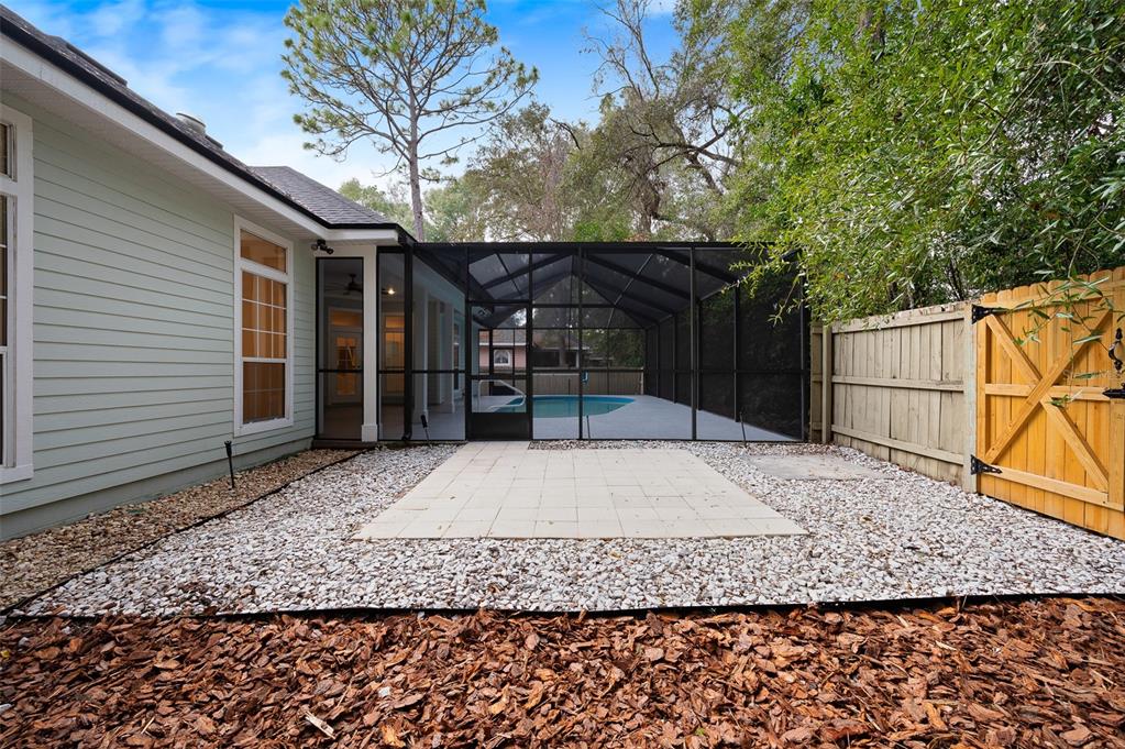 9702 Southwest 35th Lane Gainesville, FL 32608 - Photo 40 of 46 a view of a backyard