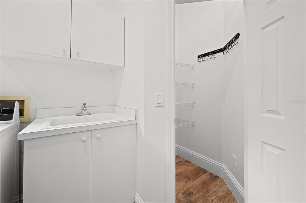 9702 Southwest 35th Lane Gainesville, FL 32608 - Photo 42 of 46 a bathroom with a sink and mirror