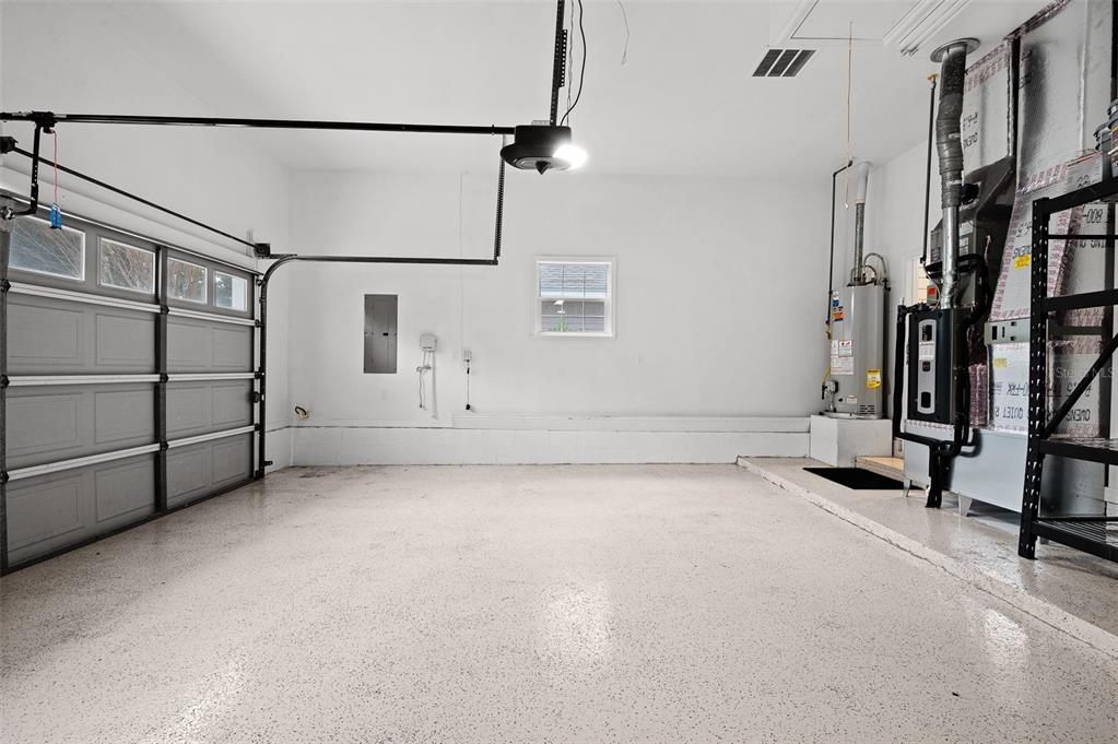 9702 Southwest 35th Lane Gainesville, FL 32608 - Photo 46 of 46 a view of a room with racks on the wall