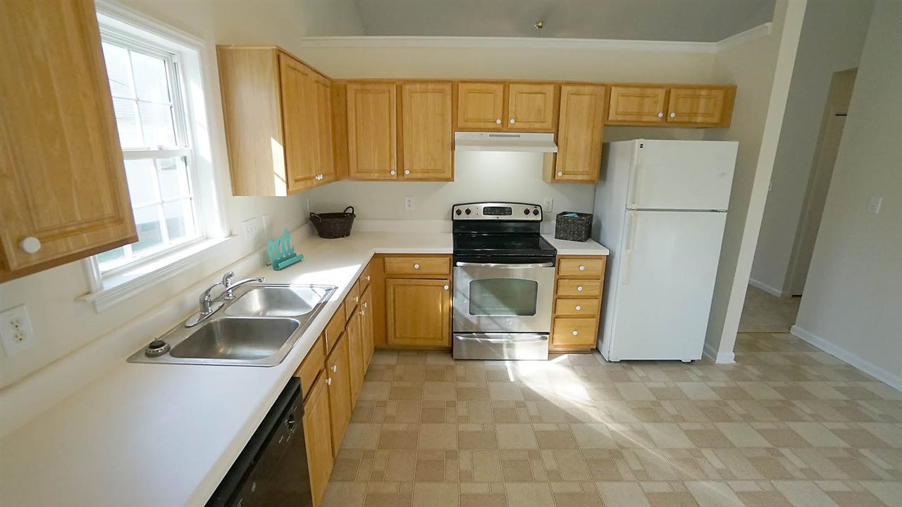 701 Kavkaz Street Raleigh, NC 27610 - Photo 10 of 25 Plenty of Kitchen Cabinet & Counter Space