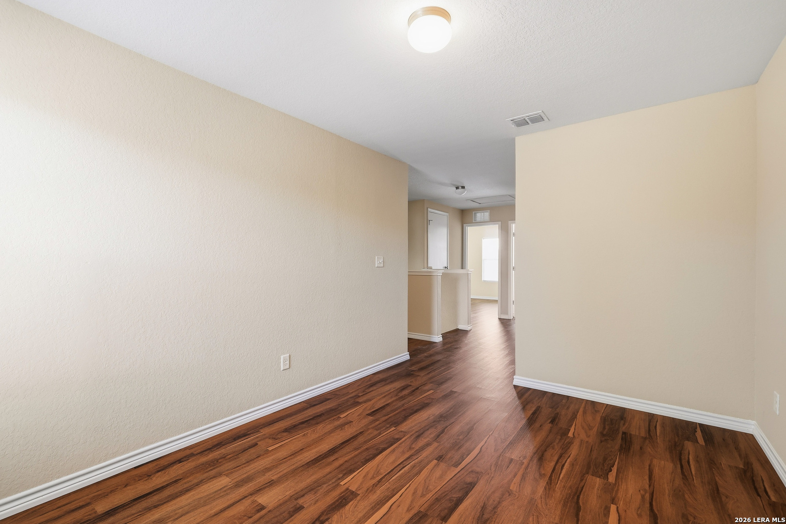 11839 Dove Ranch San Antonio, TX 78254 - Photo 20 of 35 a view of a room with wooden floor