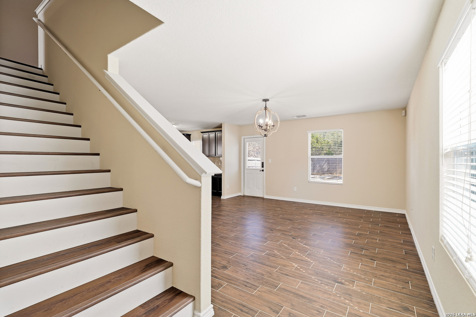 11839 Dove Ranch San Antonio, TX 78254 - Photo 2 of 35 a view of entryway and hall with wooden floor