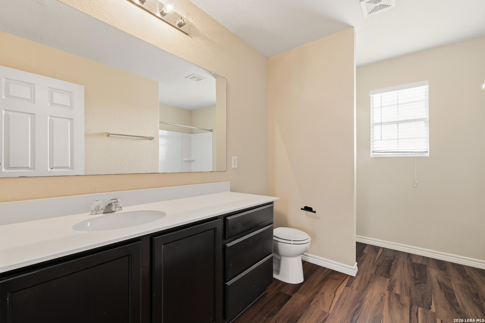 11839 Dove Ranch San Antonio, TX 78254 - Photo 23 of 35 a bathroom with a sink and a mirror