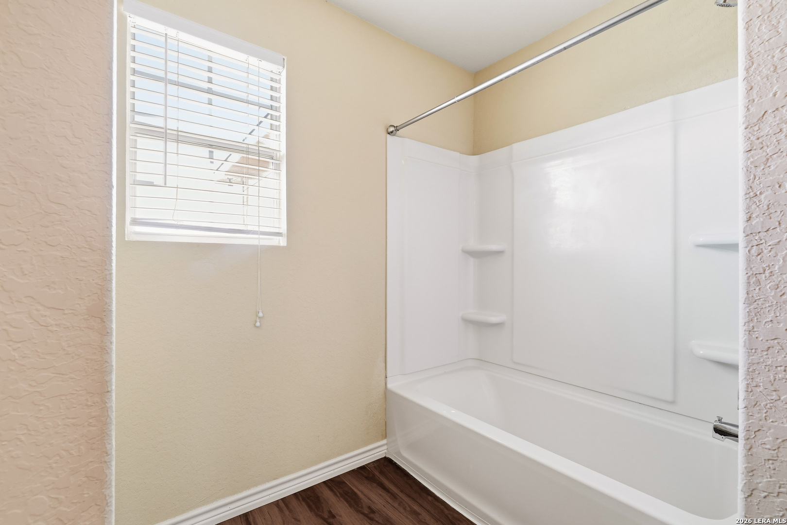 11839 Dove Ranch San Antonio, TX 78254 - Photo 24 of 35 a bathroom with a bathtub and a shower