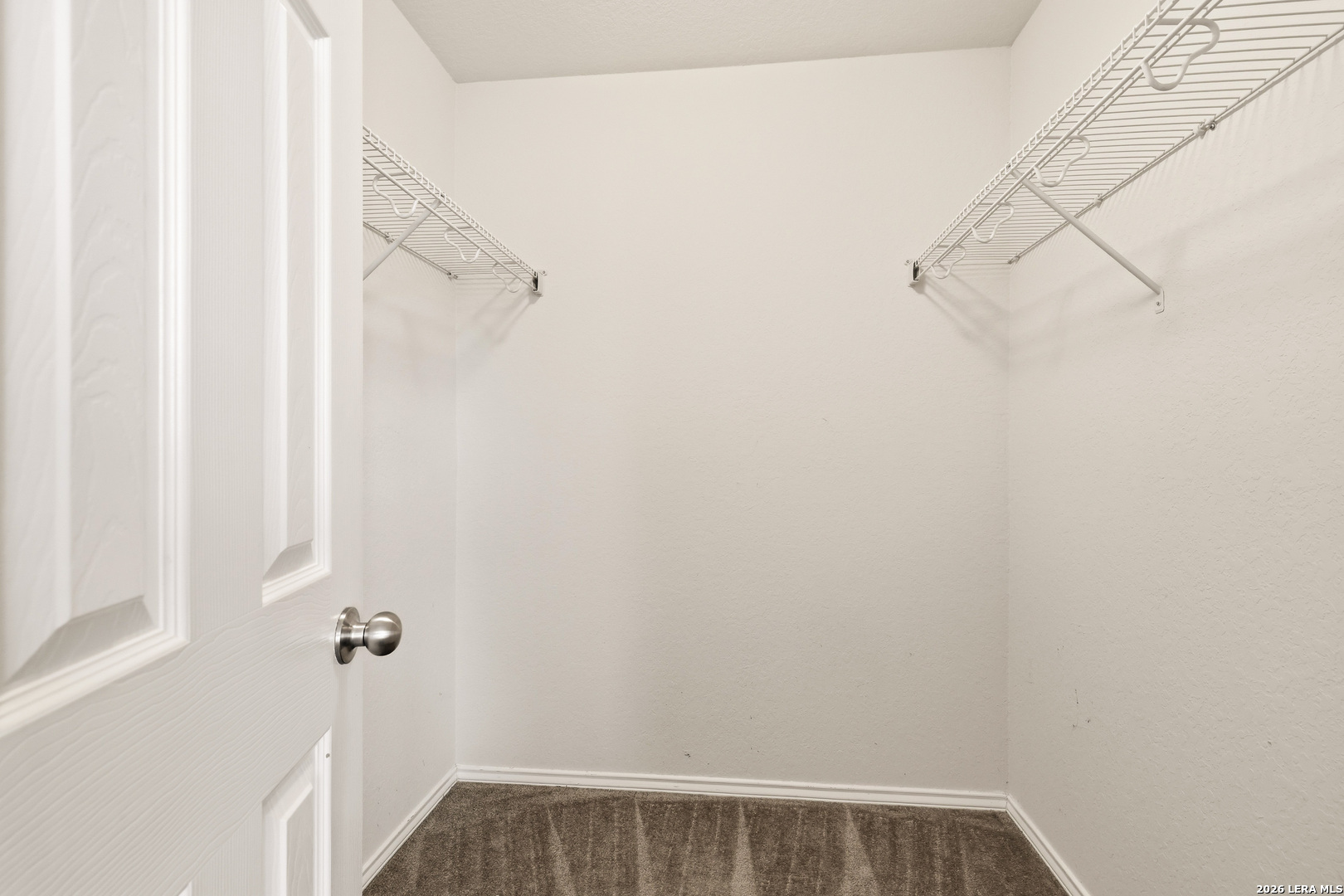 11839 Dove Ranch San Antonio, TX 78254 - Photo 25 of 35 a view of a room with racks on the wall