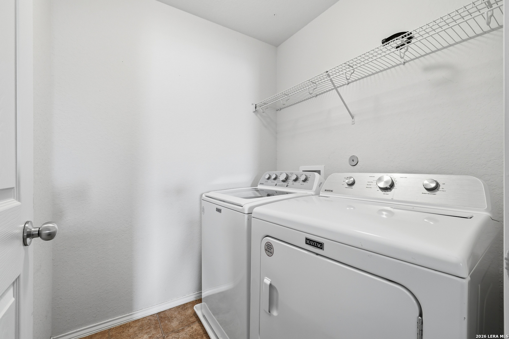 11839 Dove Ranch San Antonio, TX 78254 - Photo 31 of 35 a utility room with dryer and washer