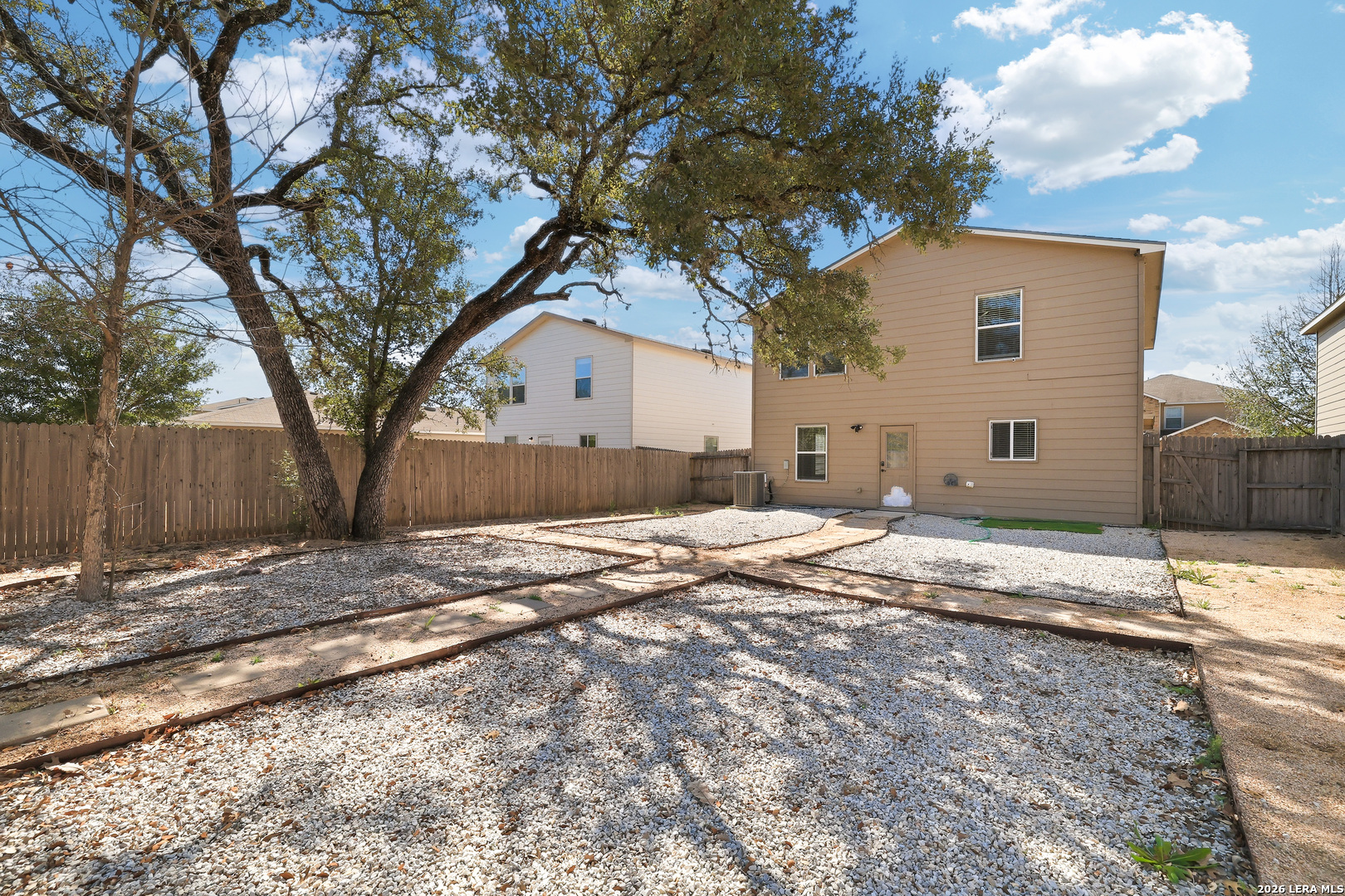 11839 Dove Ranch San Antonio, TX 78254 - Photo 33 of 35 a house with trees in front of it