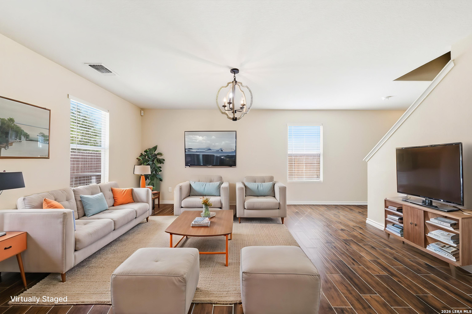 11839 Dove Ranch San Antonio, TX 78254 - Photo 7 of 35 a living room with furniture a flat screen tv and a window