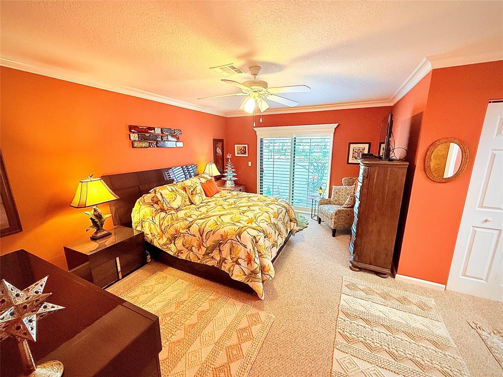 3117 Kingswood Terrace, Unit 3117 Boca Raton, FL 33431 - Photo 4 of 15 a bedroom with a bed and wooden floor