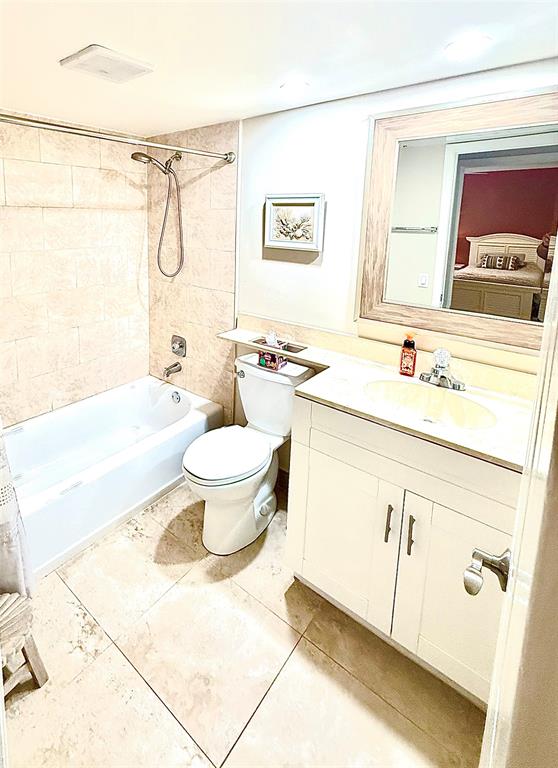 3117 Kingswood Terrace, Unit 3117 Boca Raton, FL 33431 - Photo 6 of 15 a bathroom with a sink toilet and shower