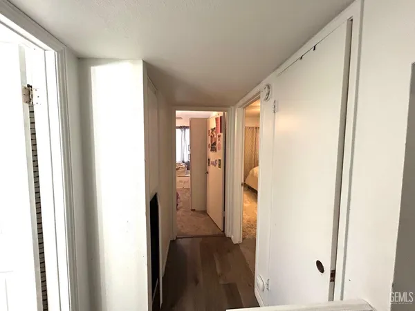 a view of entryway with wooden floor