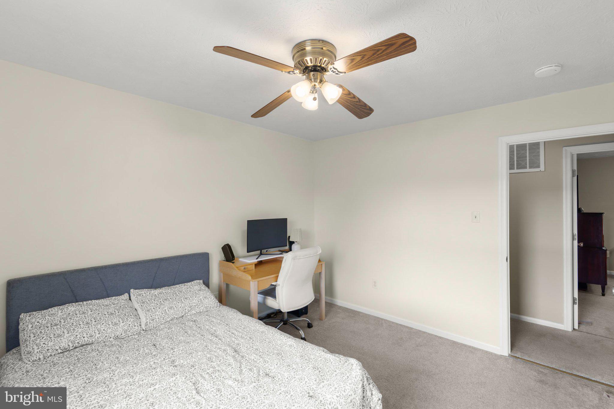111 Asbury Road Winchester, VA 22602 - Photo 21 of 39 Cozy bedroom with modern amenities.