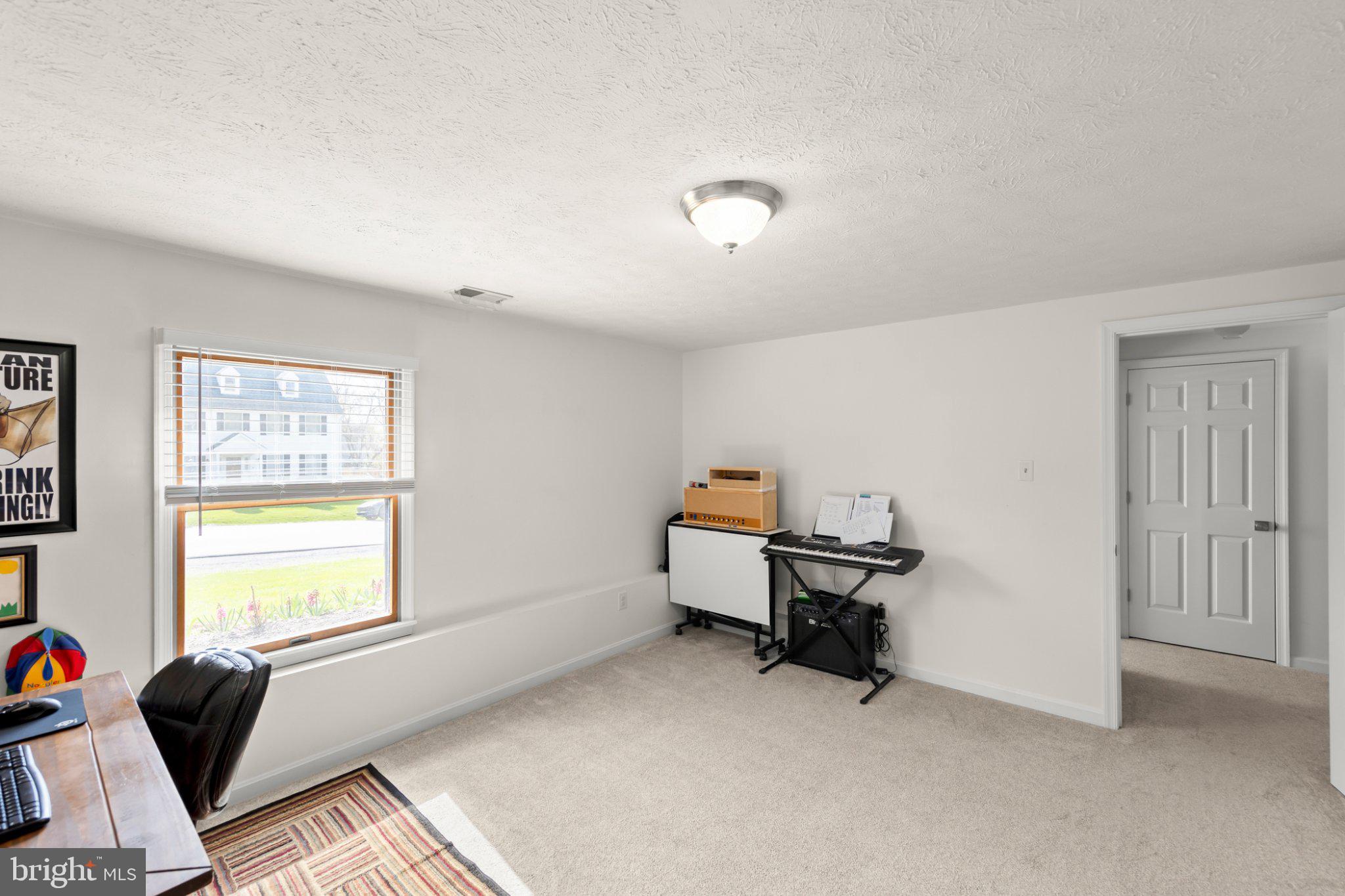 111 Asbury Road Winchester, VA 22602 - Photo 30 of 39 Bright and versatile home office space.