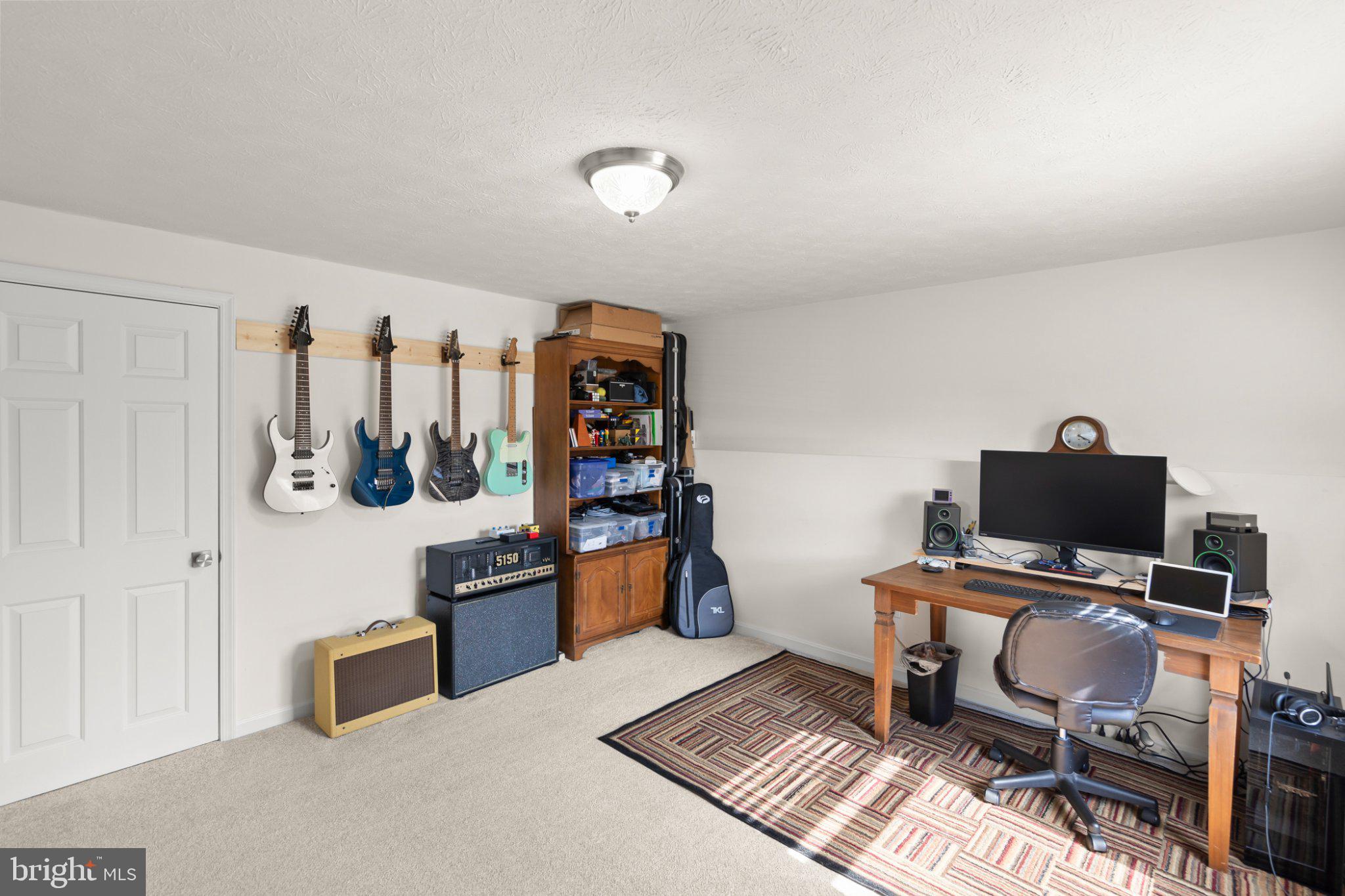 111 Asbury Road Winchester, VA 22602 - Photo 31 of 39 Creative music haven with workspace.