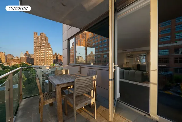a kitchen with a sink cabinets and wooden floor