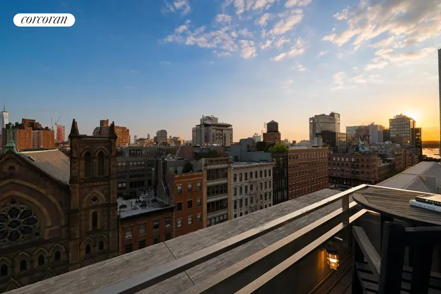 a view of a city with tall buildings