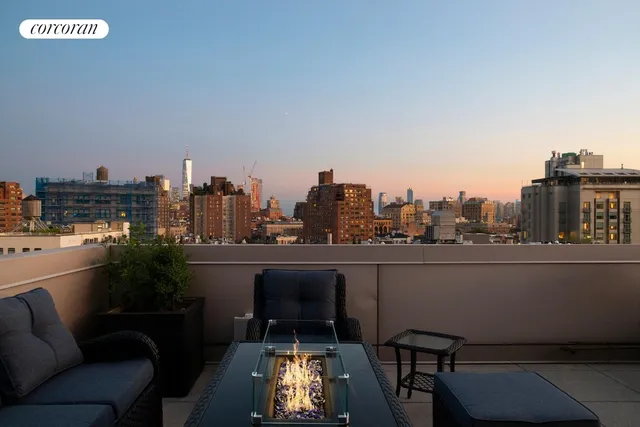a view of a terrace with sitting area
