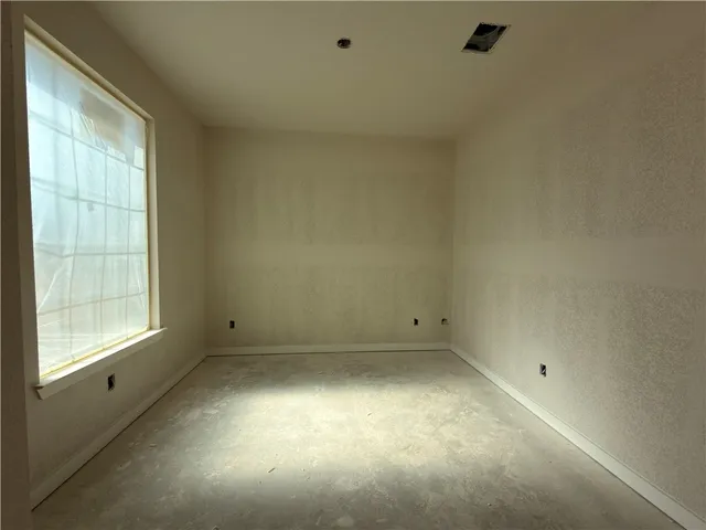 an empty room with a window