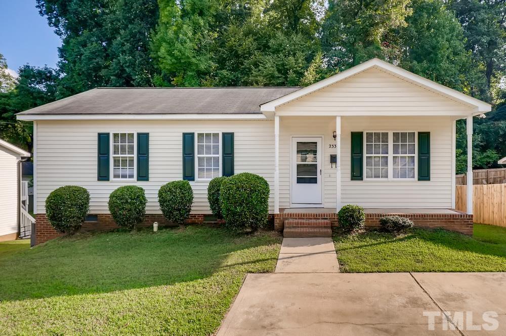 2336 Milburnie Road Raleigh, NC 27610 - Photo 2 of 28 a front view of a house with a yard