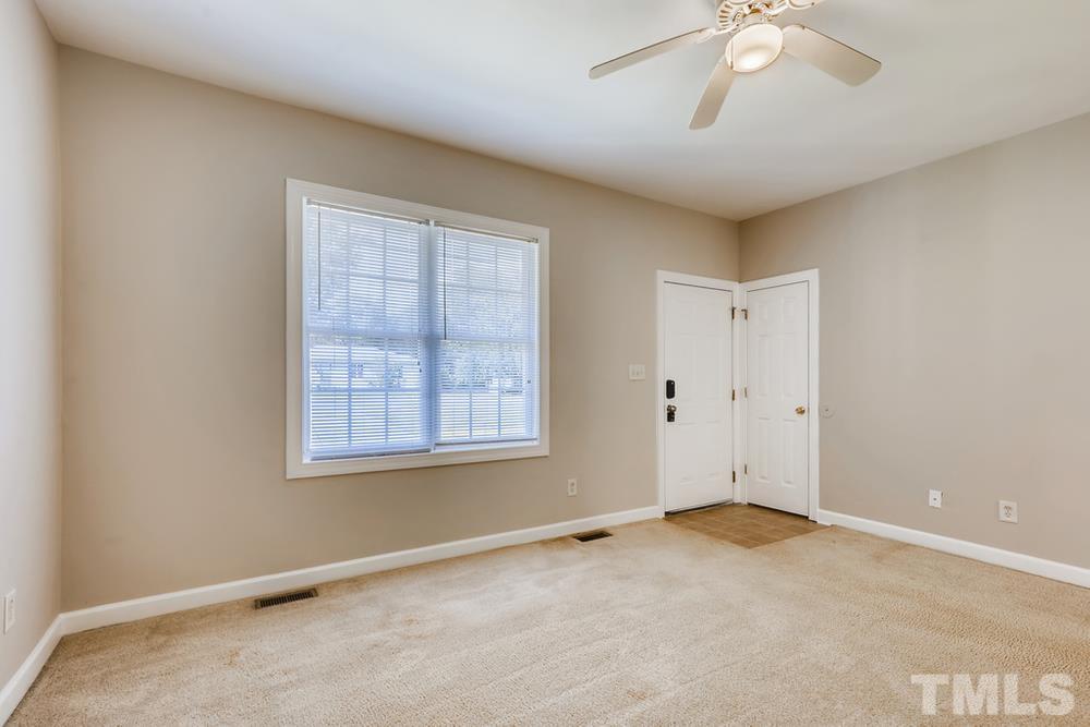 2336 Milburnie Road Raleigh, NC 27610 - Photo 6 of 28 an empty room with a window