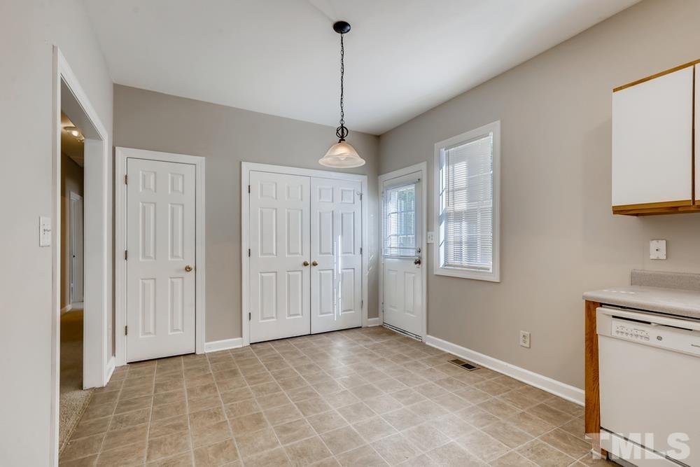2336 Milburnie Road Raleigh, NC 27610 - Photo 9 of 28 a view of a room with window and cabinet