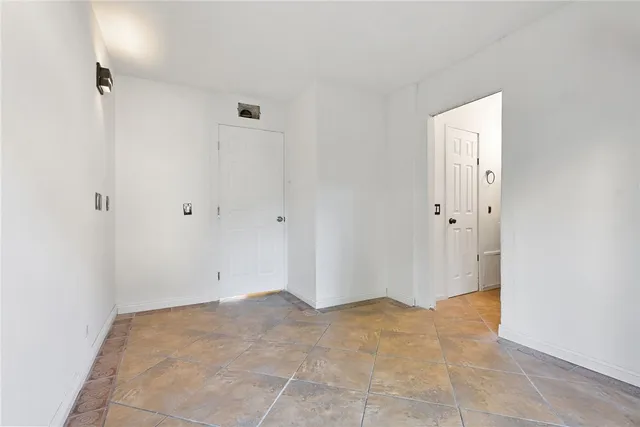 a kitchen with a stove and a sink